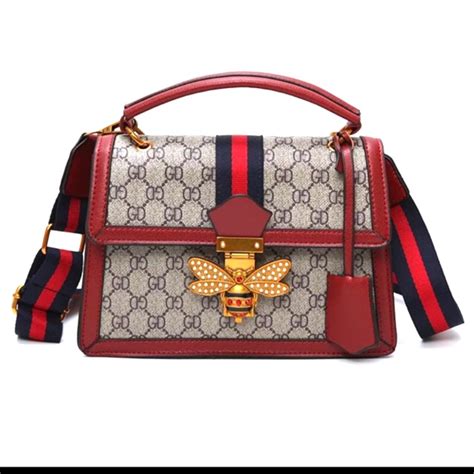 gucci bag with butterfly buckle